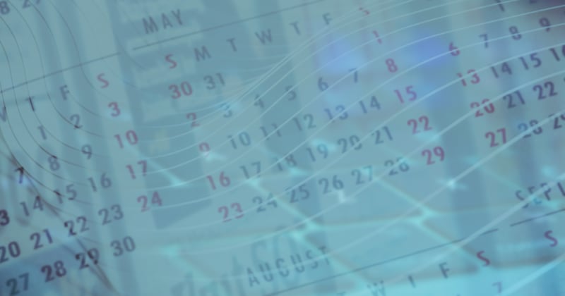 A calendar below an image of a laptop keyboard